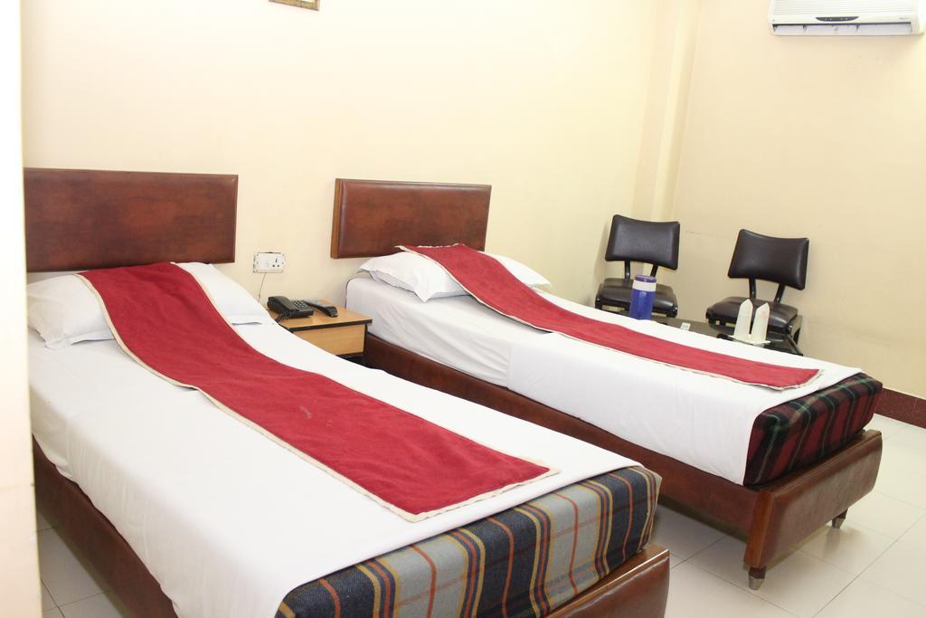 Hotel Bengal International Siliguri Pokoj fotografie