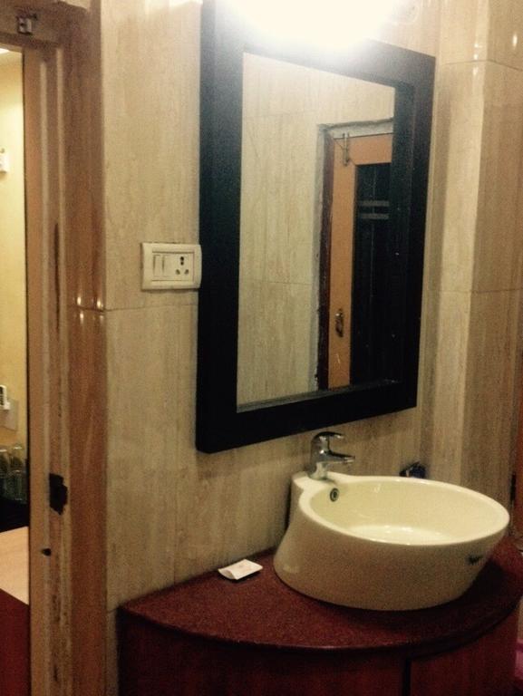 Hotel Bengal International Siliguri Pokoj fotografie