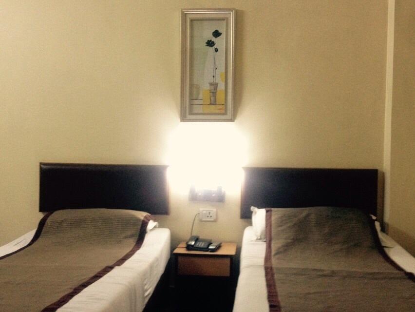 Hotel Bengal International Siliguri Pokoj fotografie