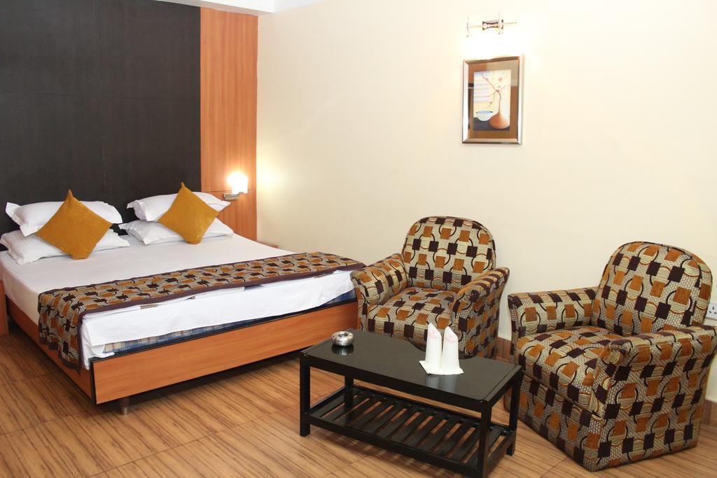Hotel Bengal International Siliguri Pokoj fotografie