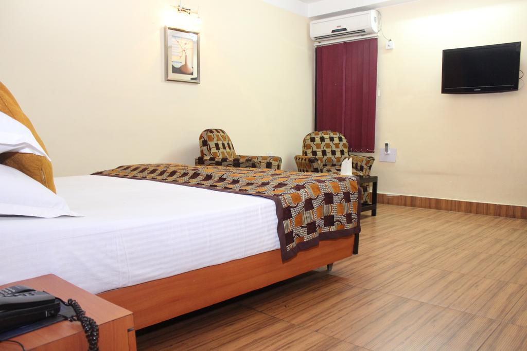 Hotel Bengal International Siliguri Pokoj fotografie