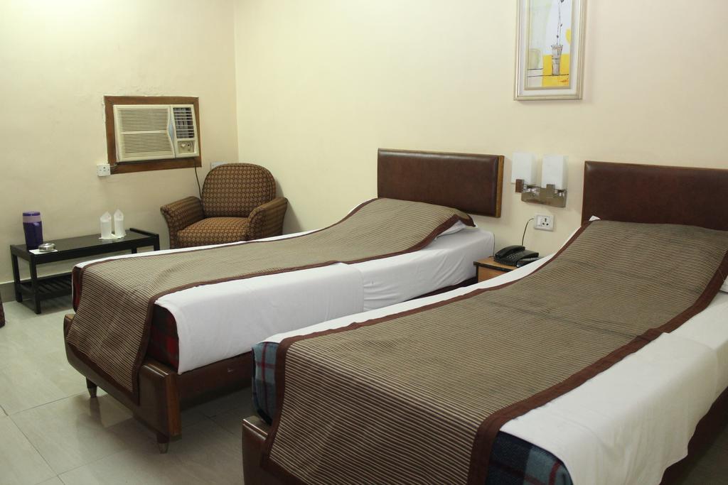 Hotel Bengal International Siliguri Pokoj fotografie