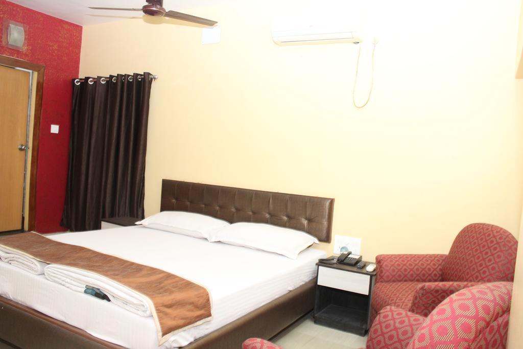 Hotel Bengal International Siliguri Pokoj fotografie