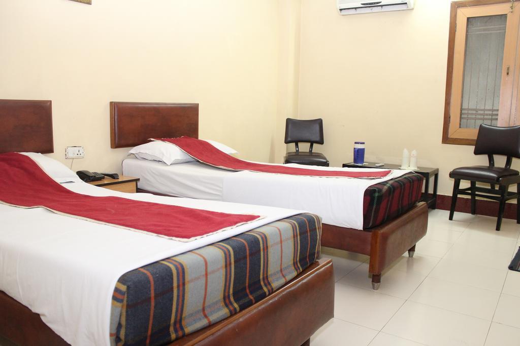 Hotel Bengal International Siliguri Pokoj fotografie