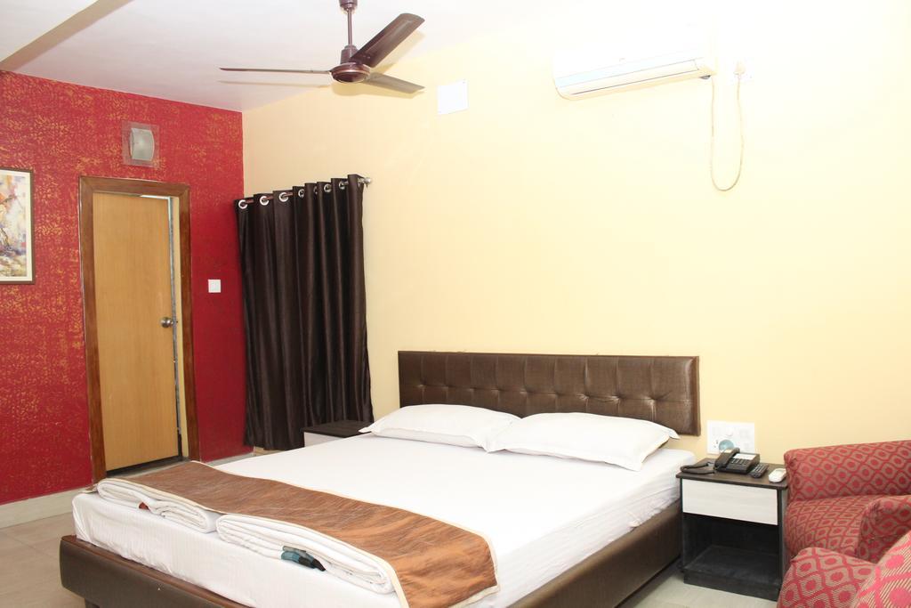 Hotel Bengal International Siliguri Pokoj fotografie
